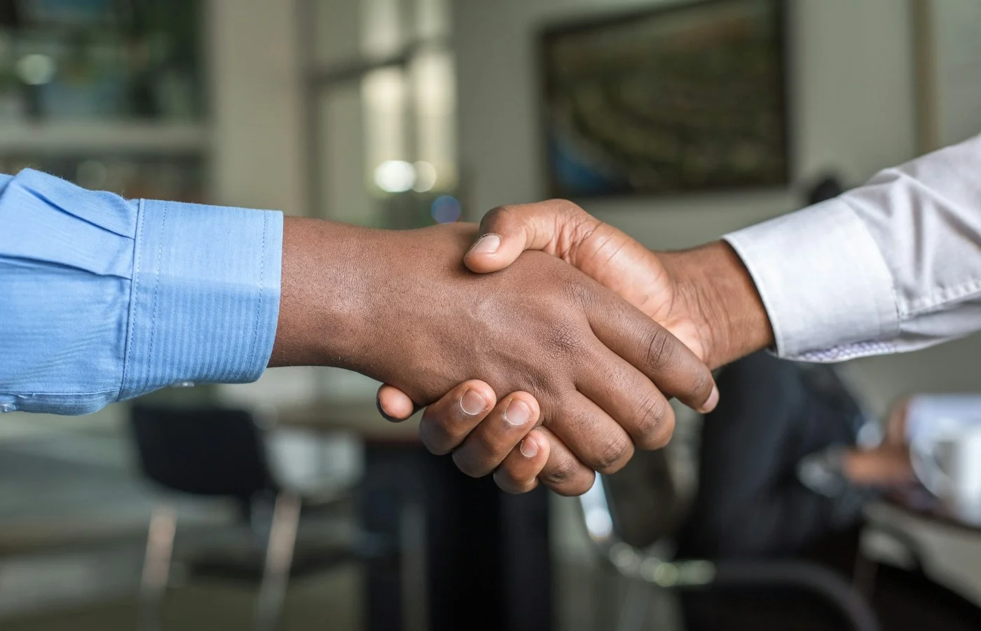Two business partners shaking hands